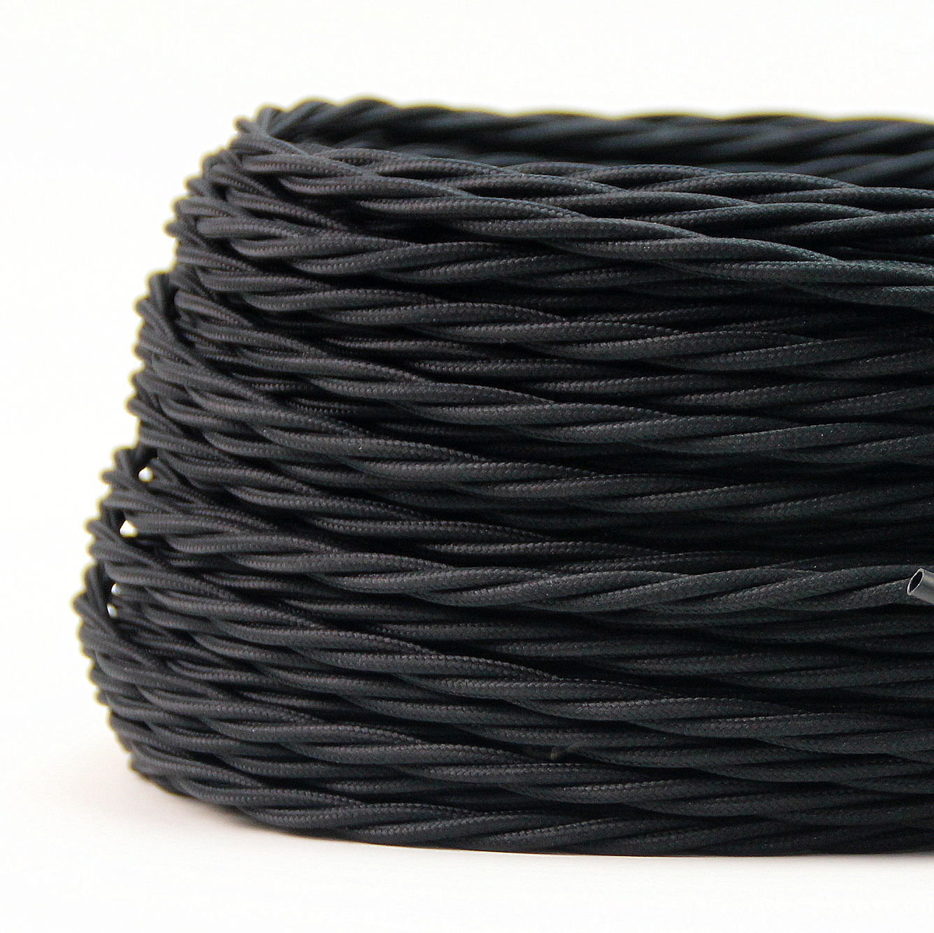 A 5-meter length of 2 core twisted braided electrical fabric lamp cable in various colors, showcasing its flexible and vintage design.