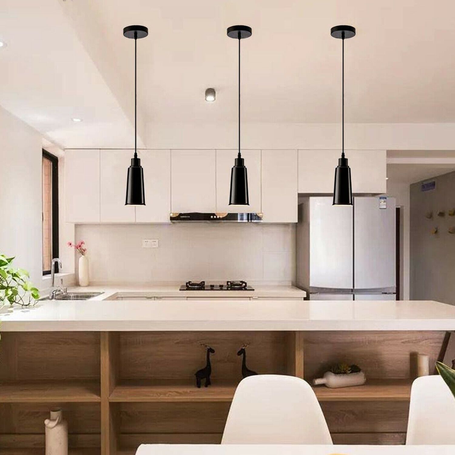 Two modern ceramic ceiling pendant lights with black finish and included bulbs, ideal for contemporary home decor.