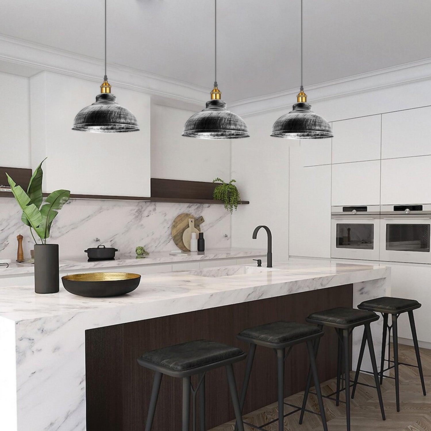 Two vintage industrial pendant lights with brushed silver metal shades, perfect for rustic home decor.