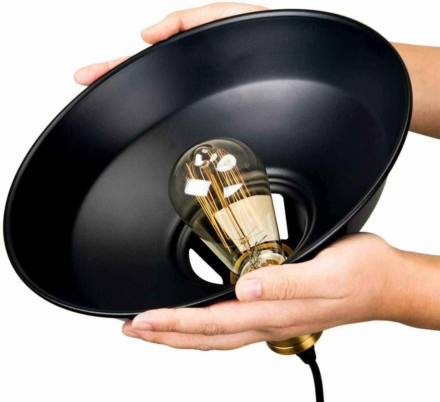 Two retro metal pendant shades in black, designed for stylish home lighting.