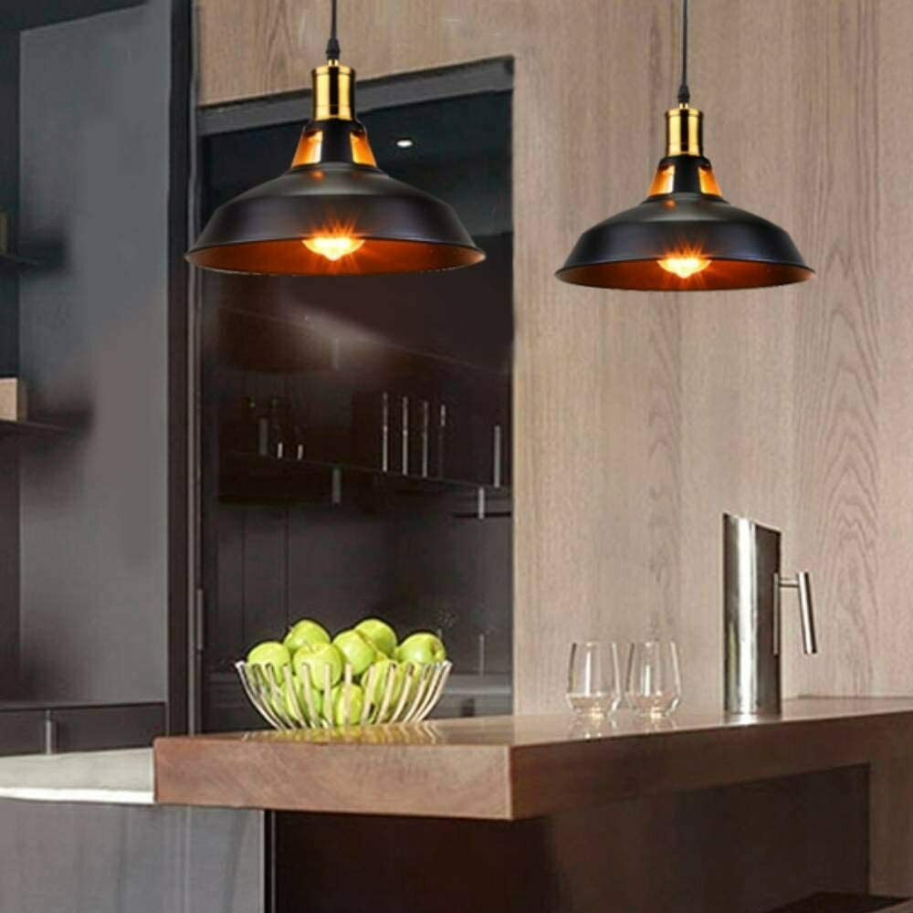 Two retro metal pendant shades in black, designed for stylish home lighting.