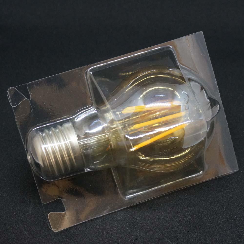 A60 B22 4W Dimmable Vintage Filament LED Bulb showcasing its classic design and warm glow.