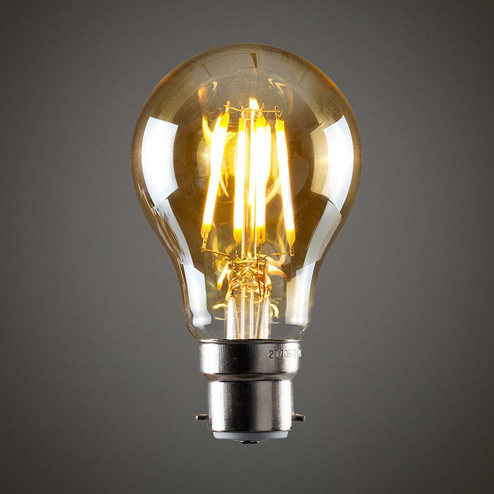 A60 B22 4W Dimmable Vintage Filament LED Bulb showcasing its classic design and warm glow.