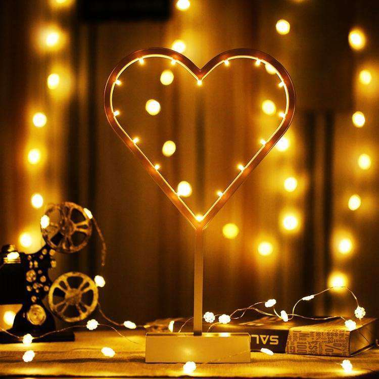 AMZER Romantic Shapes LED String Holiday Light featuring flexible copper wire in star, Christmas tree, and heart shapes, ideal for festive decorations.