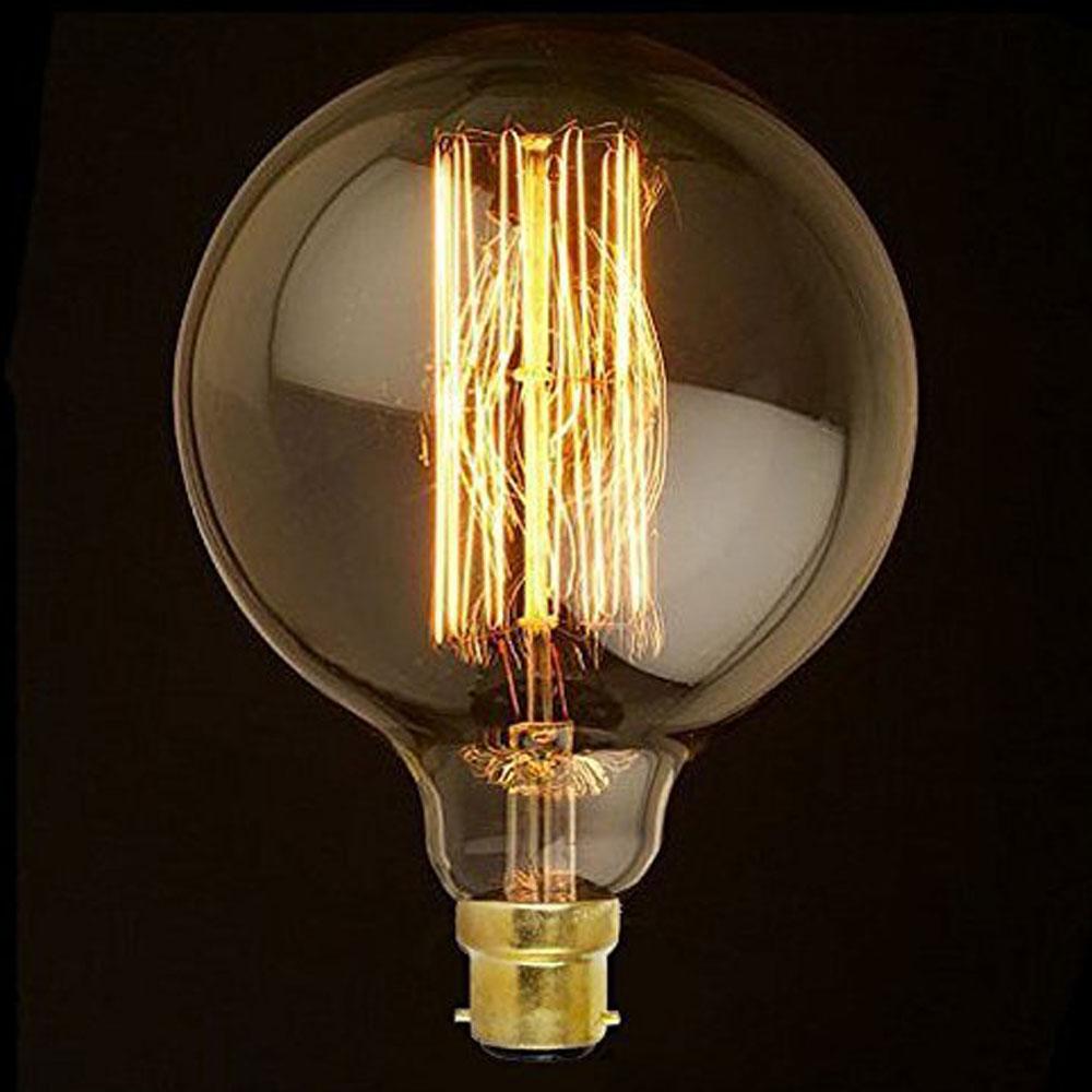 B22 G125 40W Vintage Retro Industrial Filament Bulb with warm yellow light, showcasing its elegant design and glass construction.