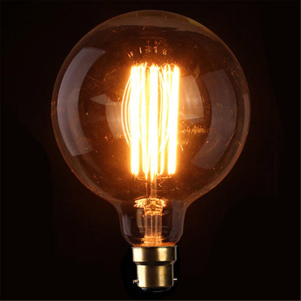 B22 G125 40W Vintage Retro Industrial Filament Bulb with warm yellow light, showcasing its elegant design and glass construction.