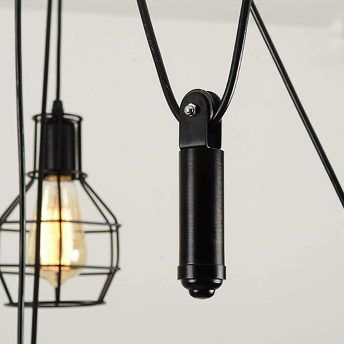 Black Spider Chandelier featuring a wire cage design with six E27 lamp holders, perfect for stylish home decor.