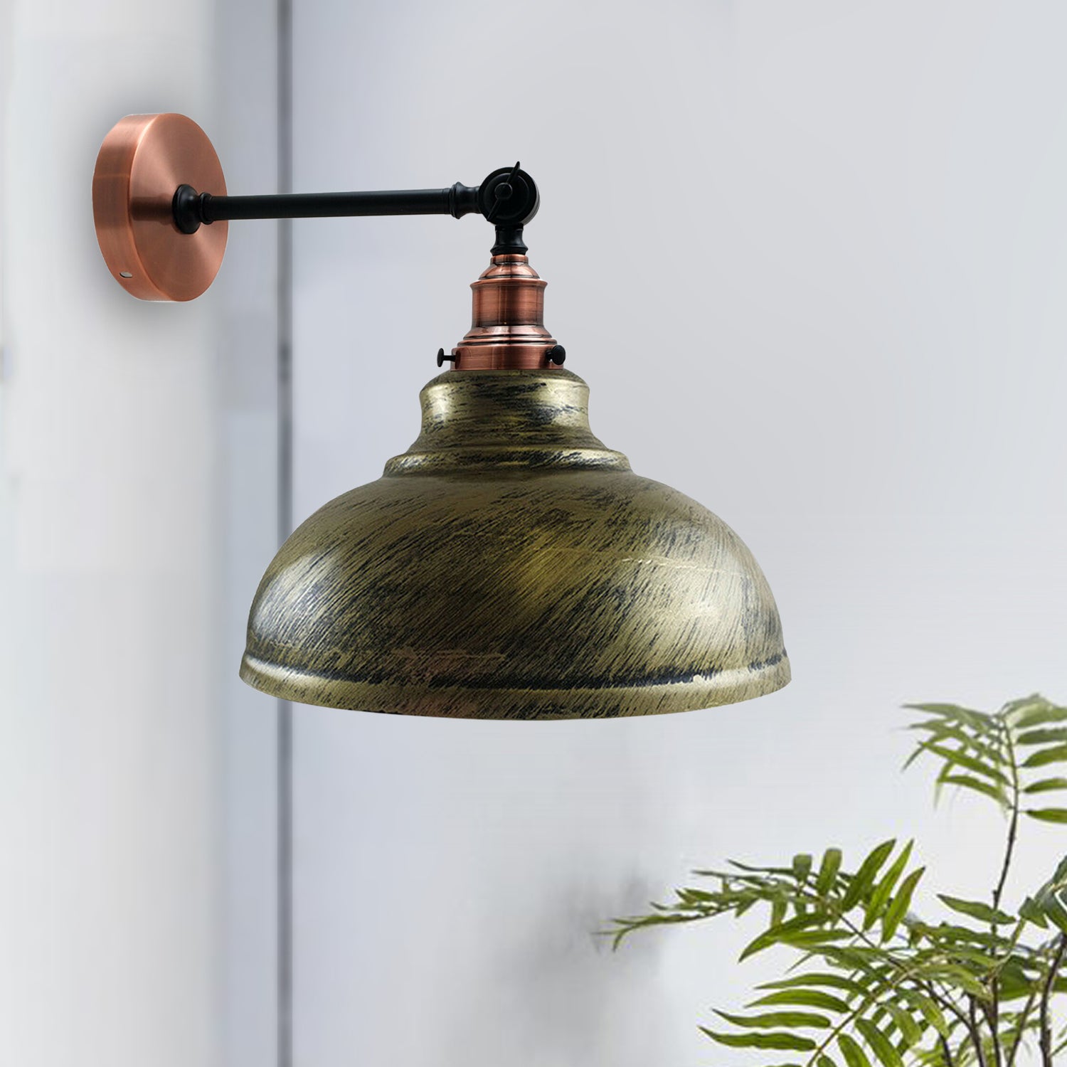 Brushed Brass Metal Curvy Wall Lamp mounted on a wall, showcasing its elegant design and soft lighting.