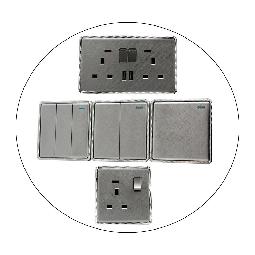 Brushed chrome screwless light switches and sockets with USB ports, showcasing a modern and elegant design.