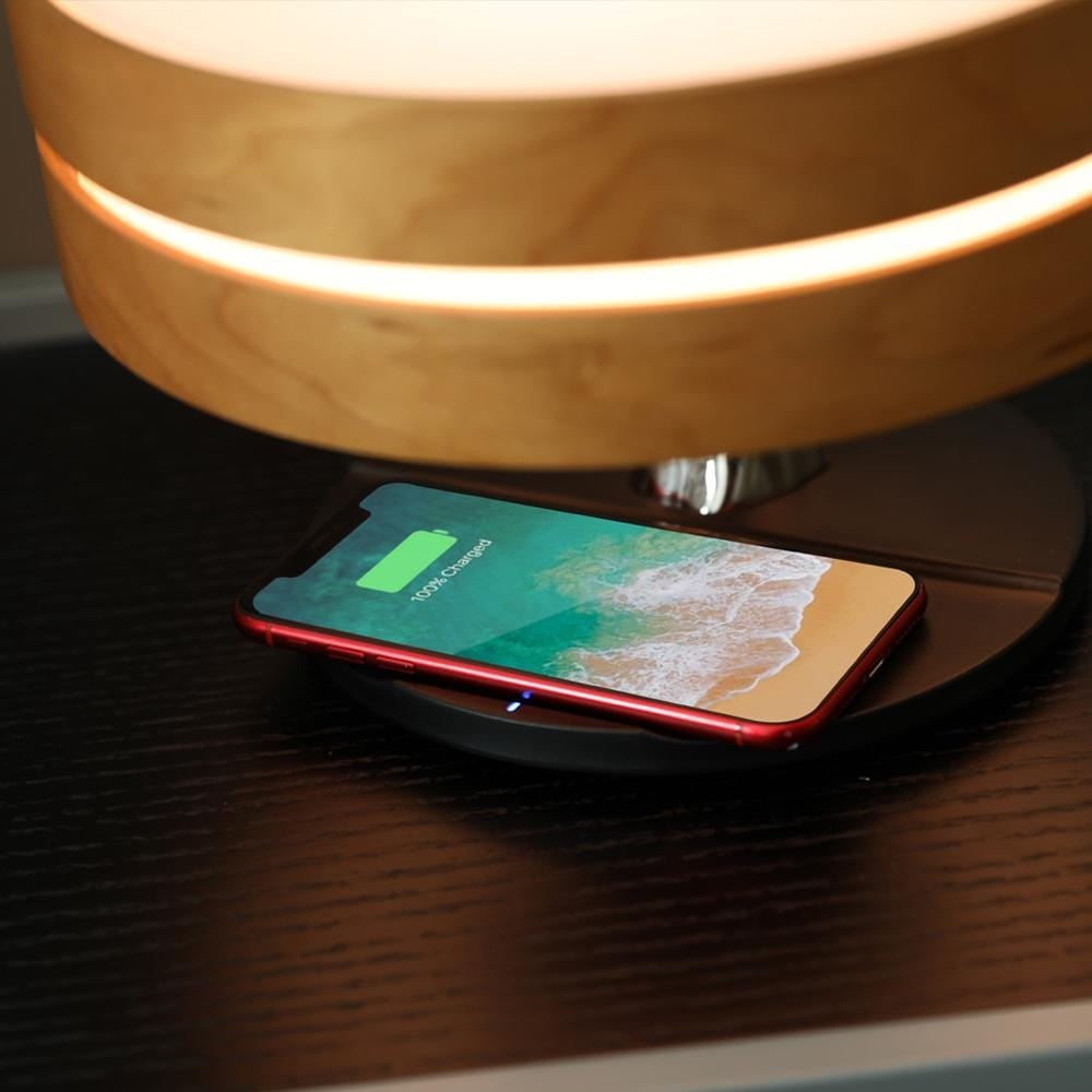 Circle of Life Bedside Lamp with wireless charging and Bluetooth speaker, featuring a sleek design and touch controls.