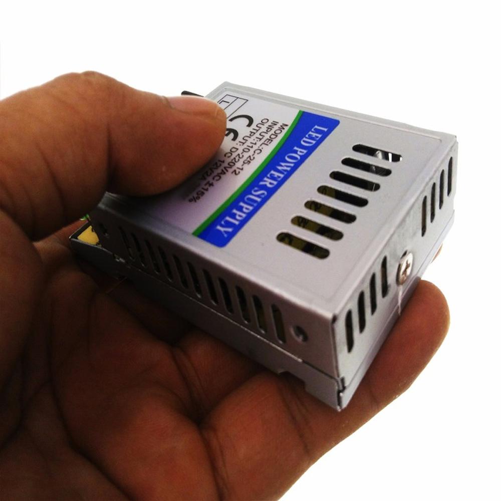 DC12V 24W IP20 Small Universal Regulated Switching Power Supply with LED lights connected.