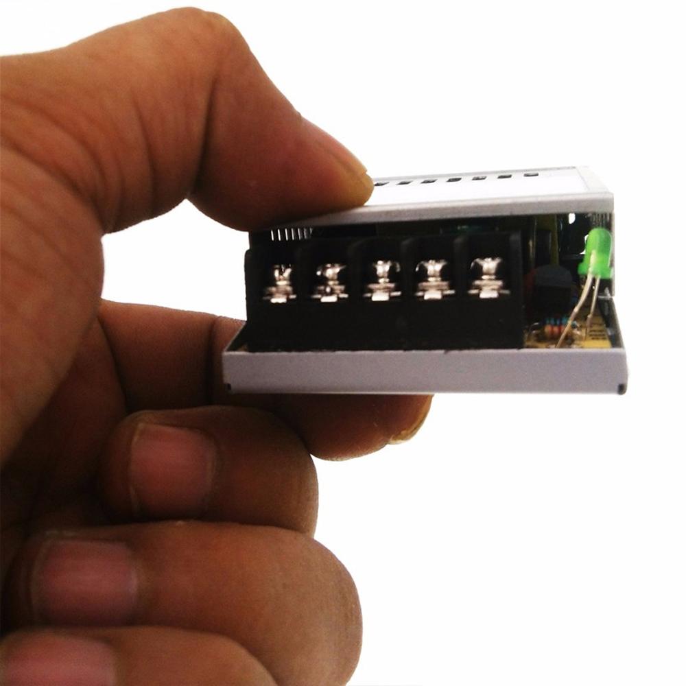 DC12V 24W IP20 Small Universal Regulated Switching Power Supply with LED lights connected.