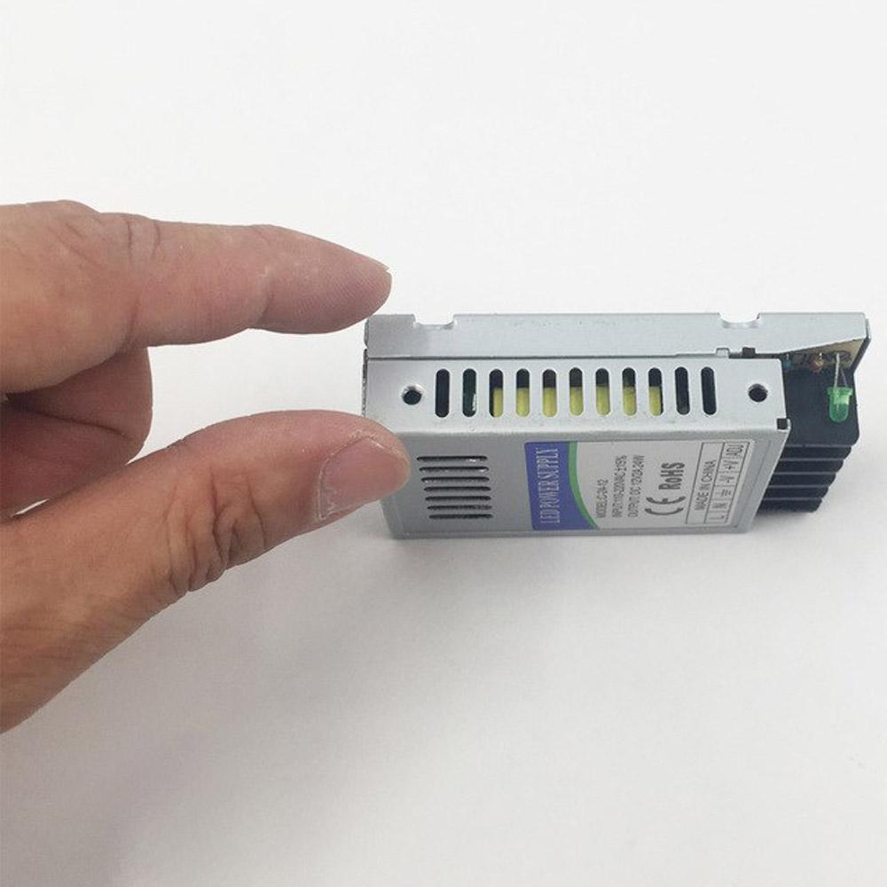 DC12V 24W IP20 Small Universal Regulated Switching Power Supply with LED lights connected.