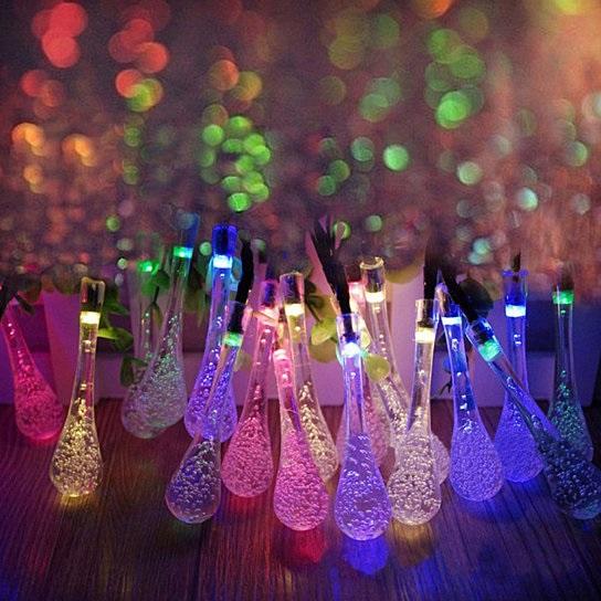 Glowing vases with colorful lights.