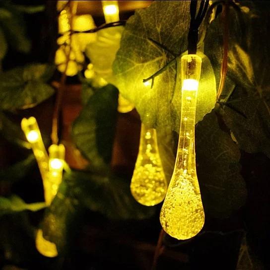 Glowing teardrop-shaped string lights.