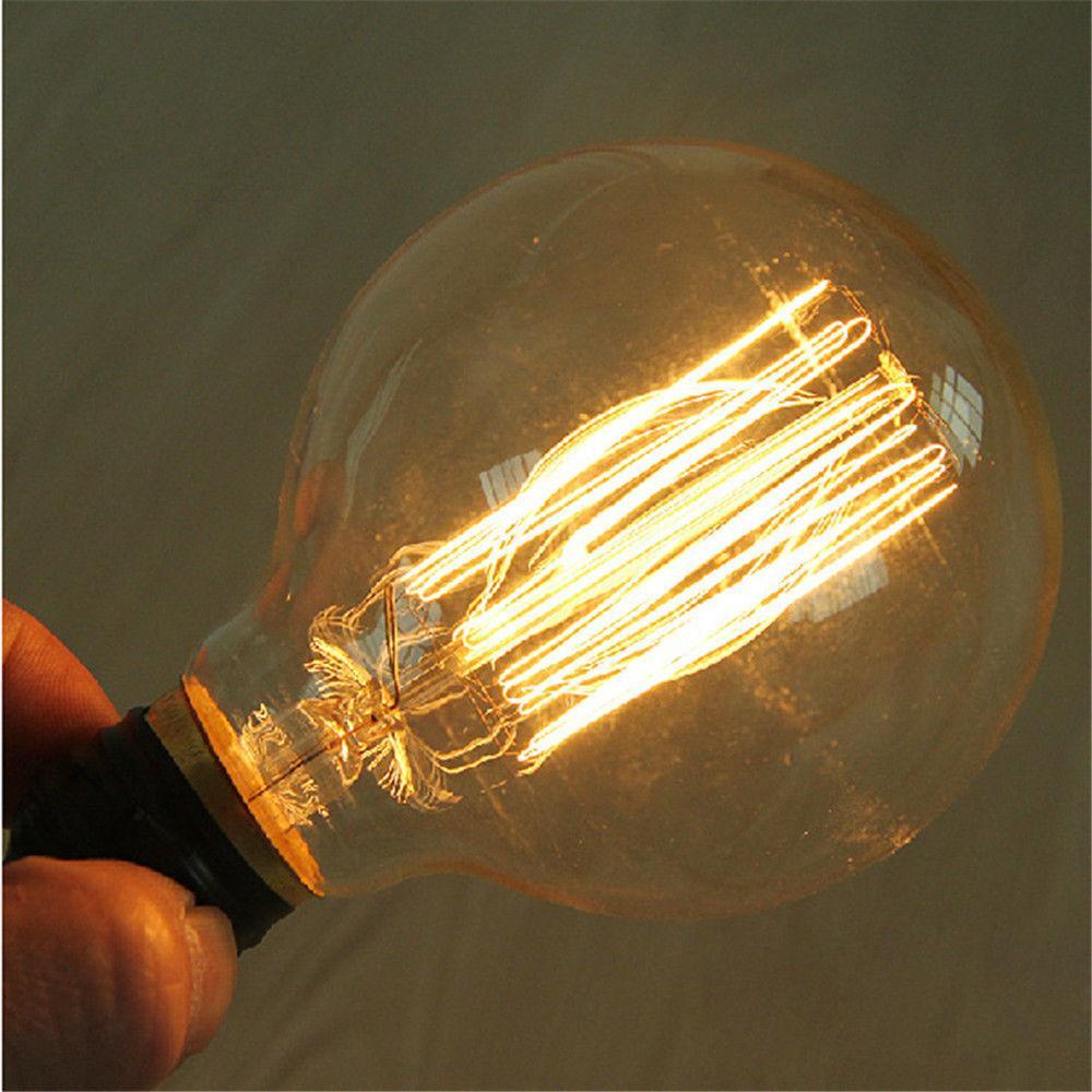 E26 G95 60W Vintage Retro Industrial Filament Dimmable Bulb showcasing warm yellow light and elegant design.