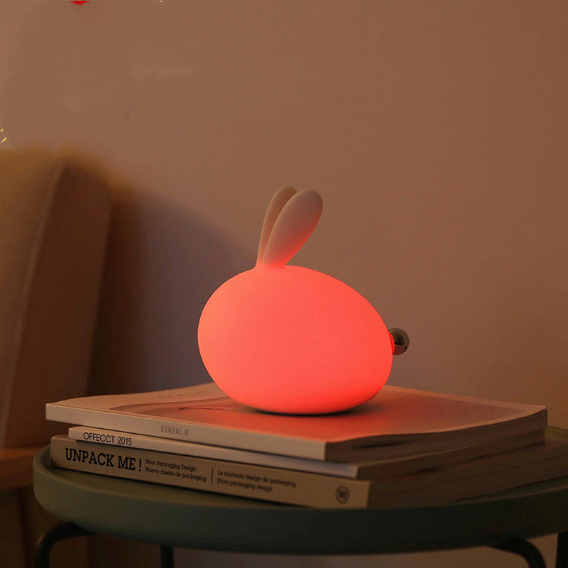 Friendly Soft Silicone USB Eye Care Night Light in the shape of a rabbit, designed for children's bedrooms with a soft glow.