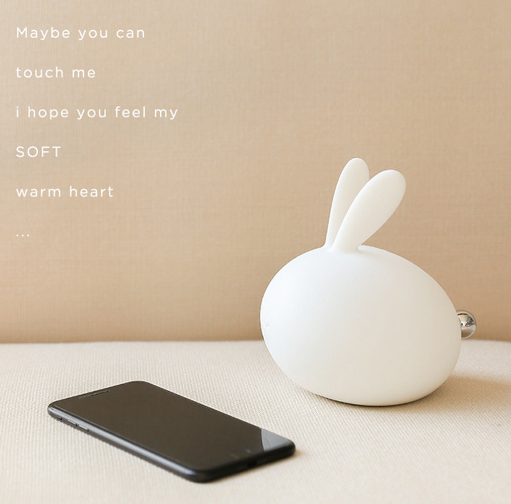 Friendly Soft Silicone USB Eye Care Night Light in the shape of a rabbit, designed for children's bedrooms with a soft glow.