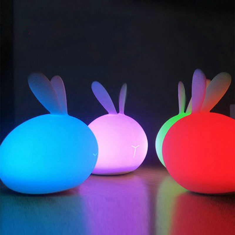 Friendly Soft Silicone USB Eye Care Night Light in the shape of a rabbit, designed for children's bedrooms with a soft glow.