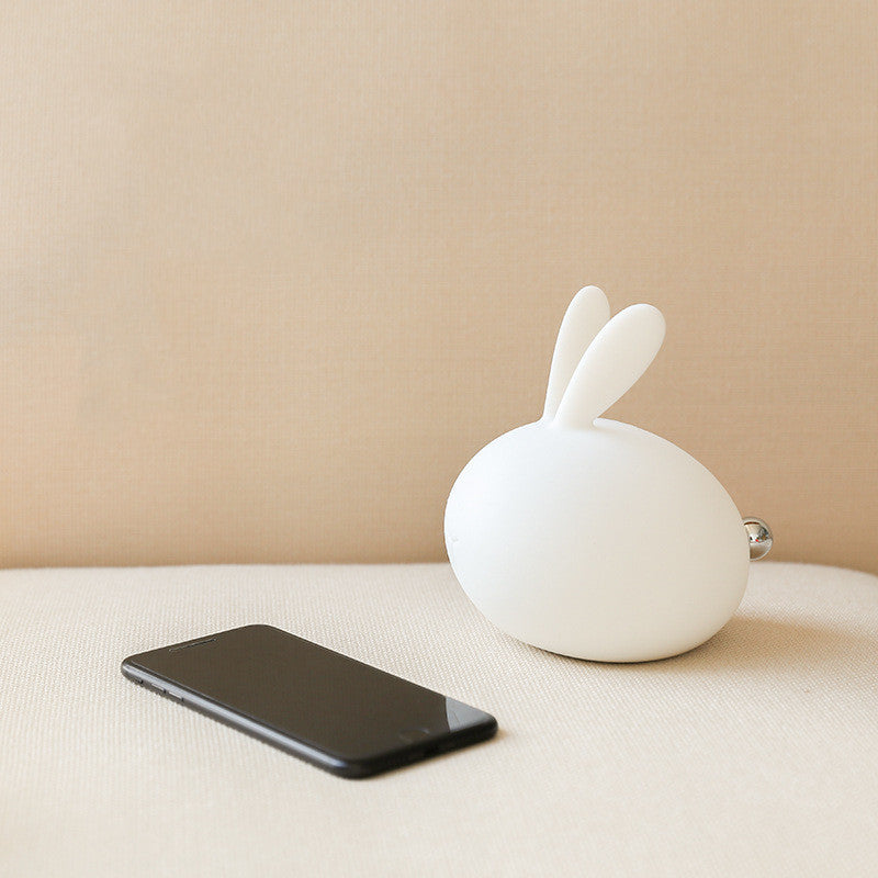 Friendly Soft Silicone USB Eye Care Night Light in the shape of a rabbit, designed for children's bedrooms with a soft glow.