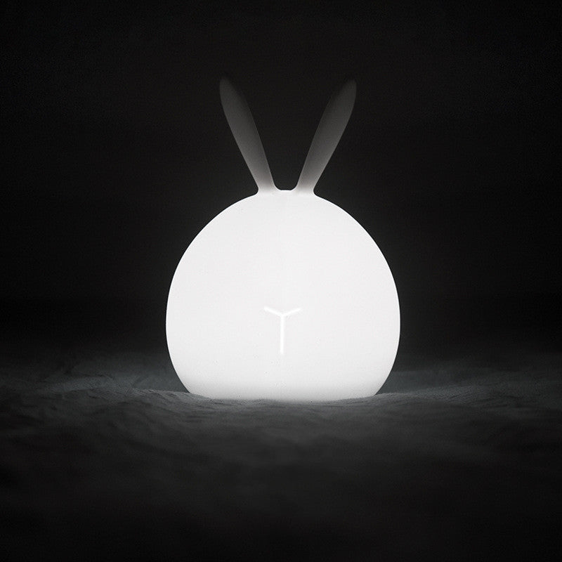 Friendly Soft Silicone USB Eye Care Night Light in the shape of a rabbit, designed for children's bedrooms with a soft glow.