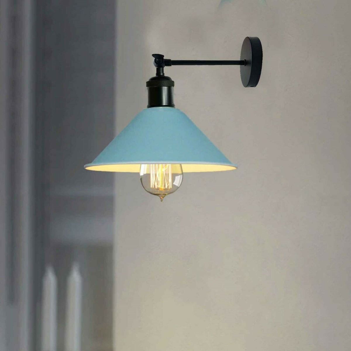 Industrial blue wall lamp with a vintage design, featuring a cone-shaped shade and adjustable arm, perfect for home and commercial use.