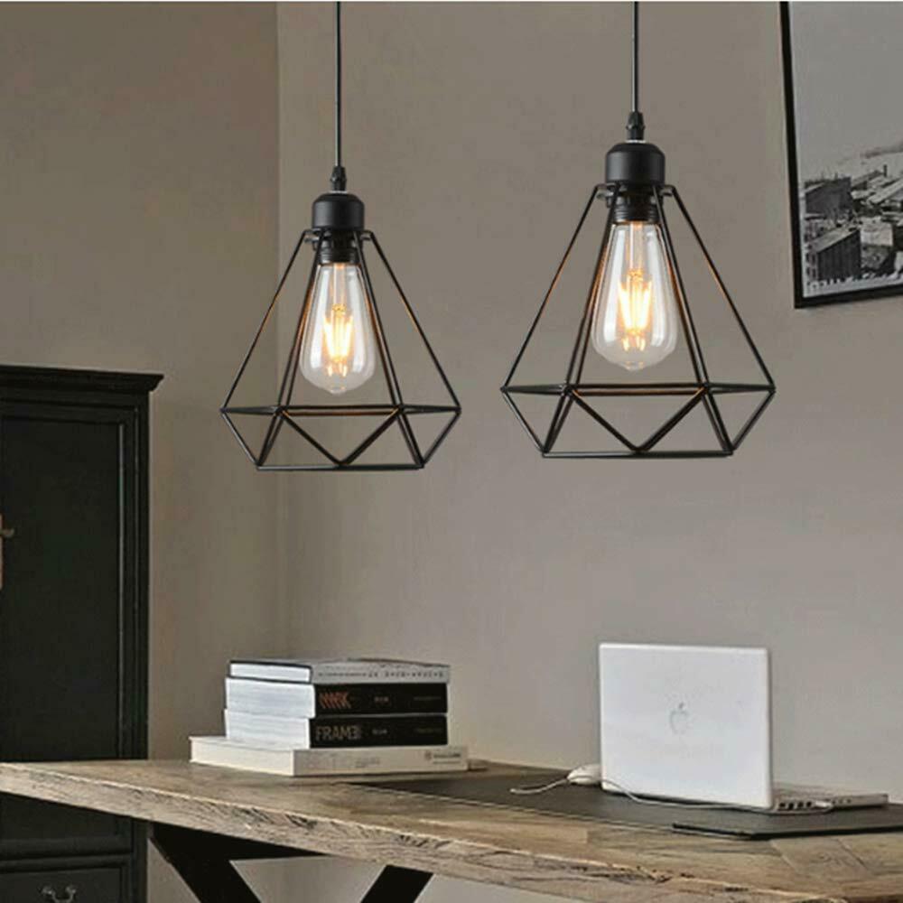 Industrial Geometric Cage Pendant Lamp showcasing a black metal design with a geometric cage structure, ideal for modern decor.