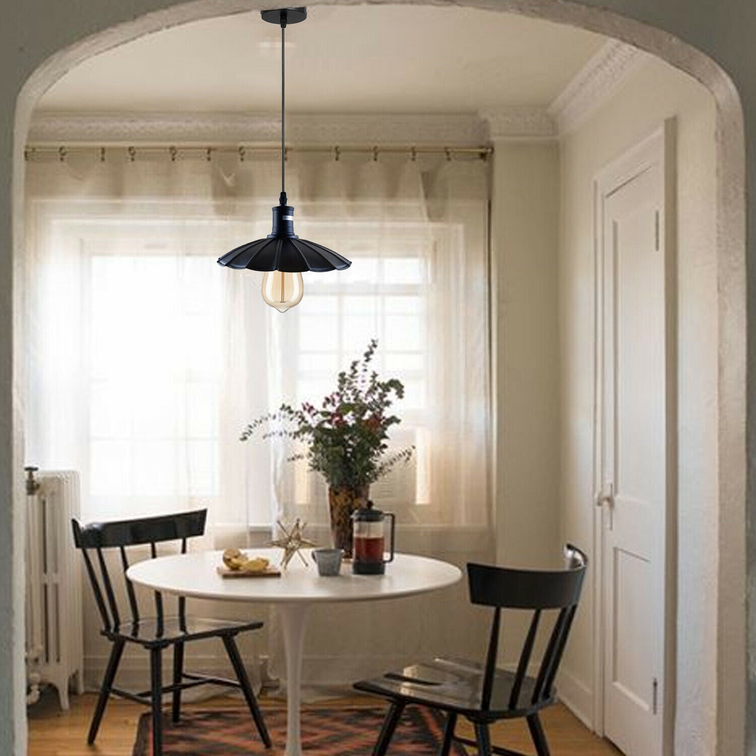 Industrial Hanging Ceiling Flower Pendant Light in black metal with PVC cable, showcasing its elegant design and adjustable height.