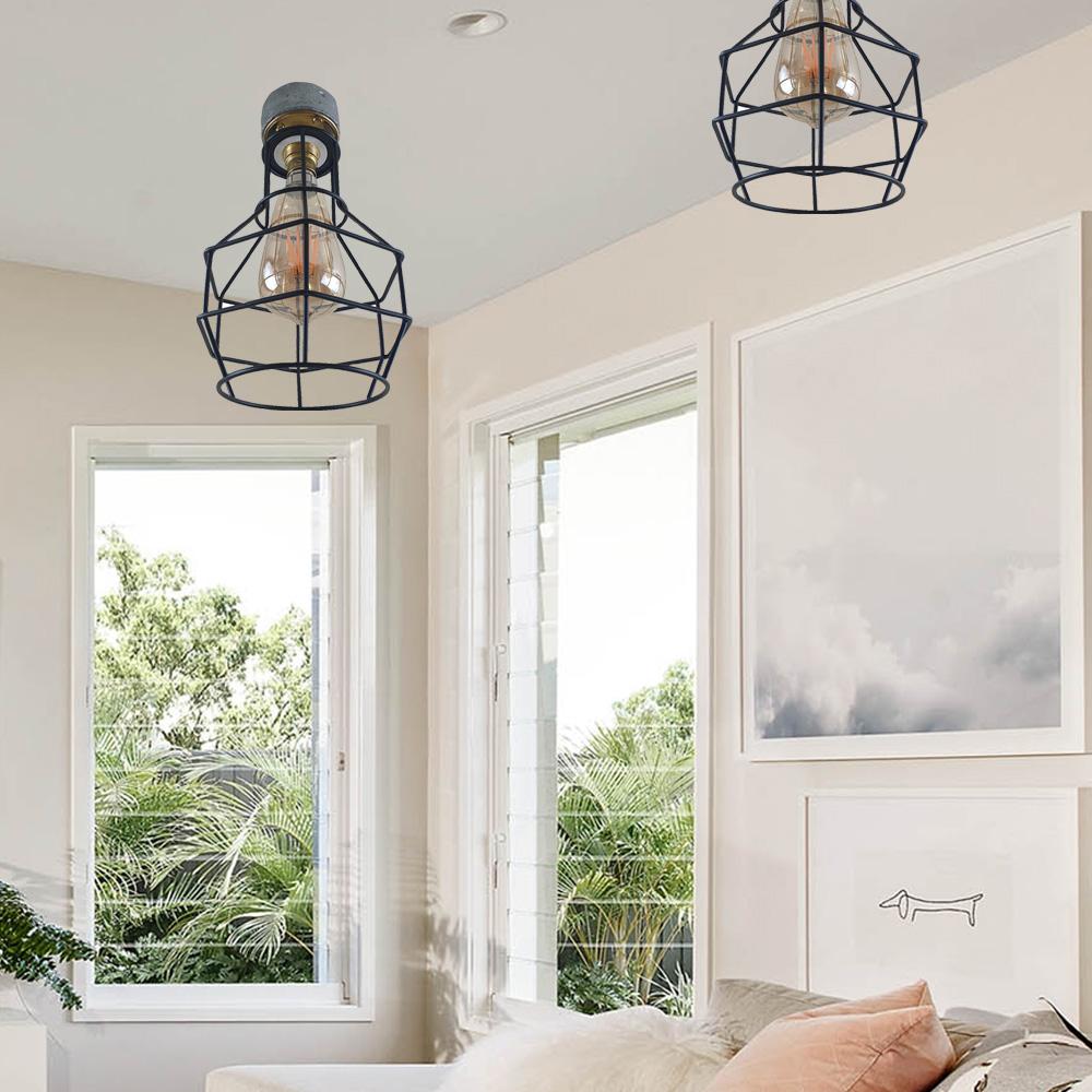 Industrial Lighting Ceiling and Wall Iron Pipe Cage Light featuring a galvanized conduit design and brass finish lamp holder.