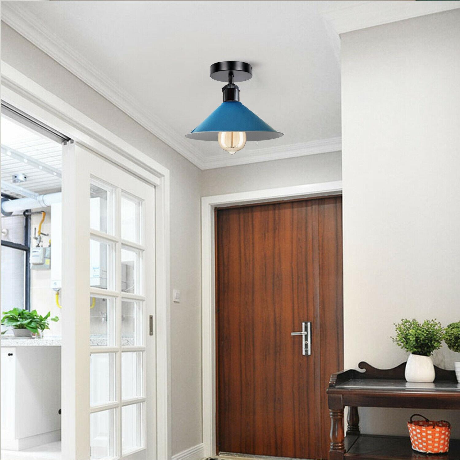 Industrial pendant lighting with a metal ceiling shade, available in multiple colors, perfect for modern living rooms.