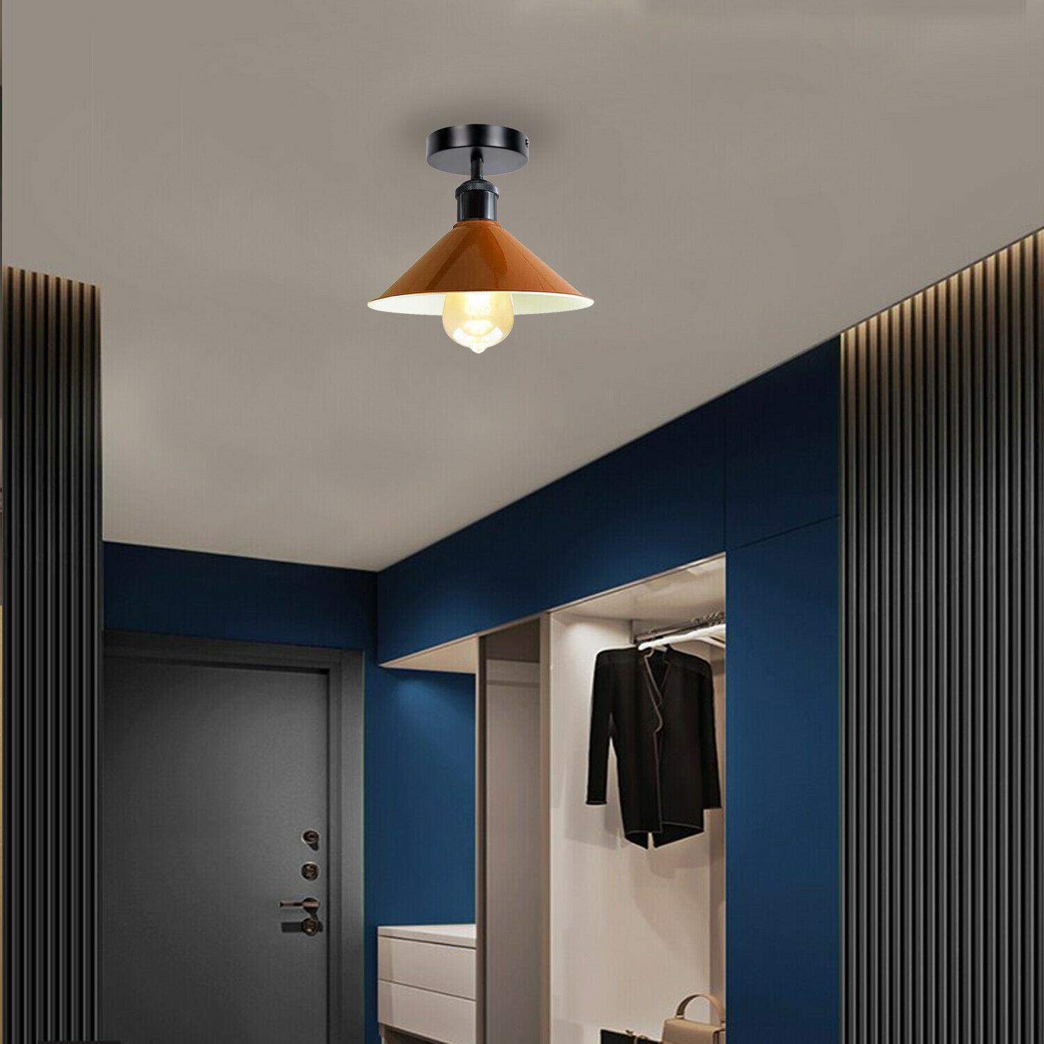 Industrial pendant lighting with a metal ceiling shade, available in multiple colors, perfect for modern living rooms.