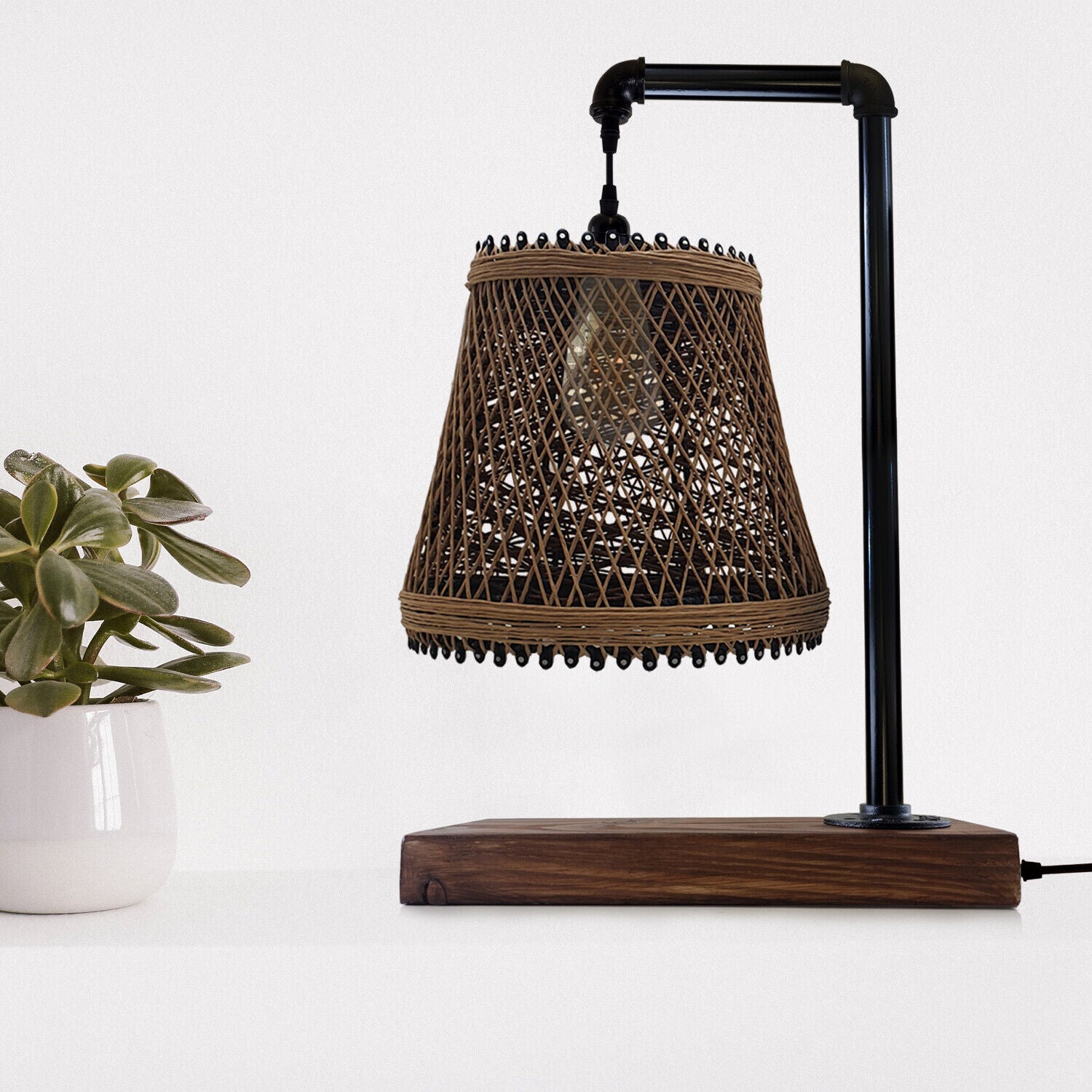 Industrial Vintage Ratio E27 Bedside Table Lamp with a black metal cage design, showcasing its elegant and retro style.