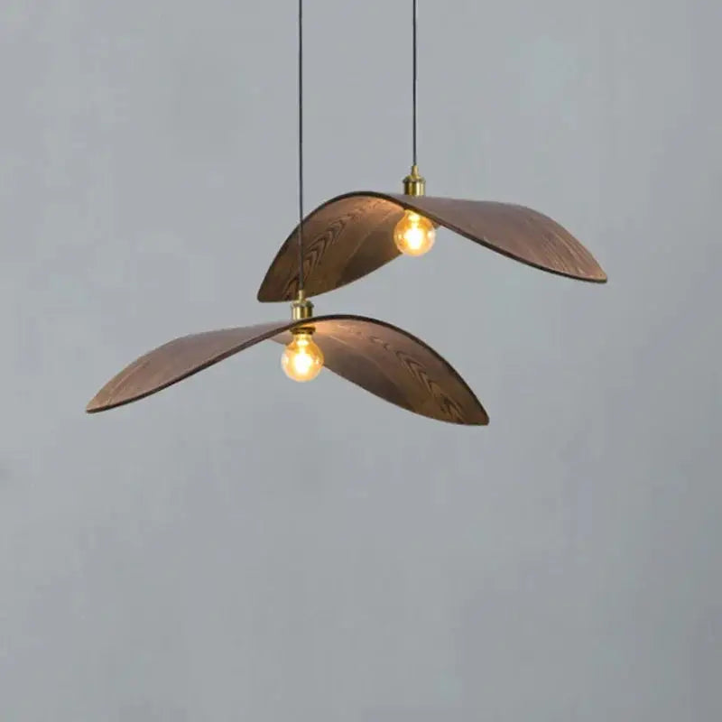 Elegant Leaf Lights chandelier with a minimalist design, handcrafted from wood, featuring a warm brown lampshade and LED bulbs.