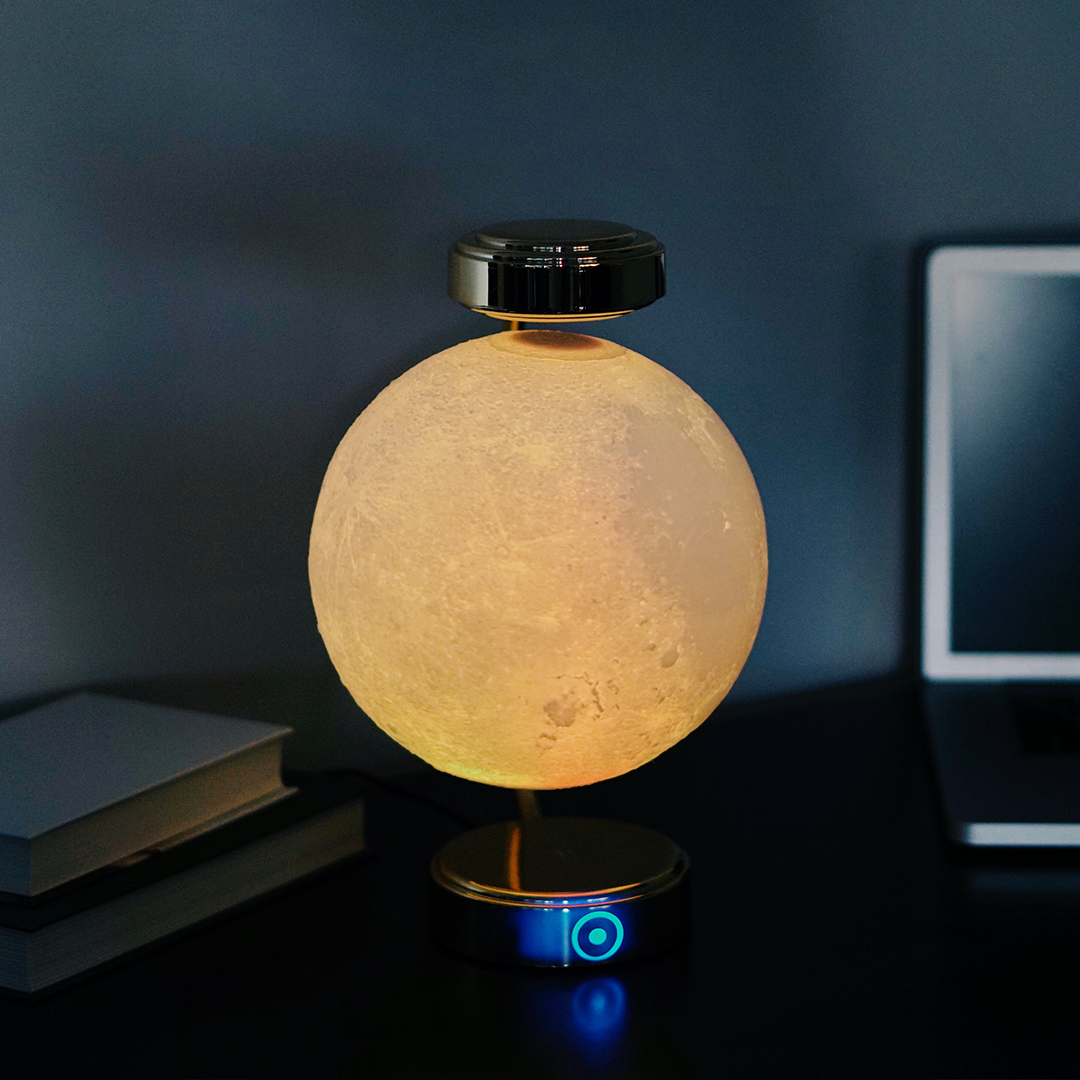 A beautifully designed 8-inch levitating moon lamp showcasing realistic lunar details and soothing colors, floating in mid-air.