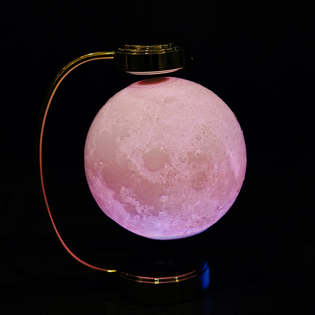 A beautifully designed 8-inch levitating moon lamp showcasing realistic lunar details and soothing colors, floating in mid-air.