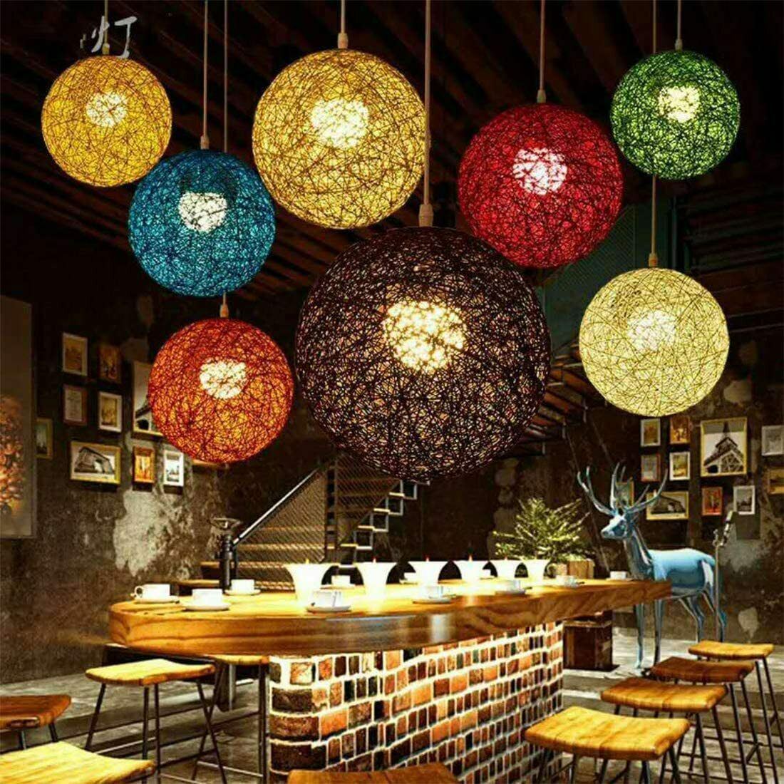 Modern Industrial Rattan Wicker Woven Ball Globe Pendant Light with two outlets, showcasing its stylish design and natural rattan texture.