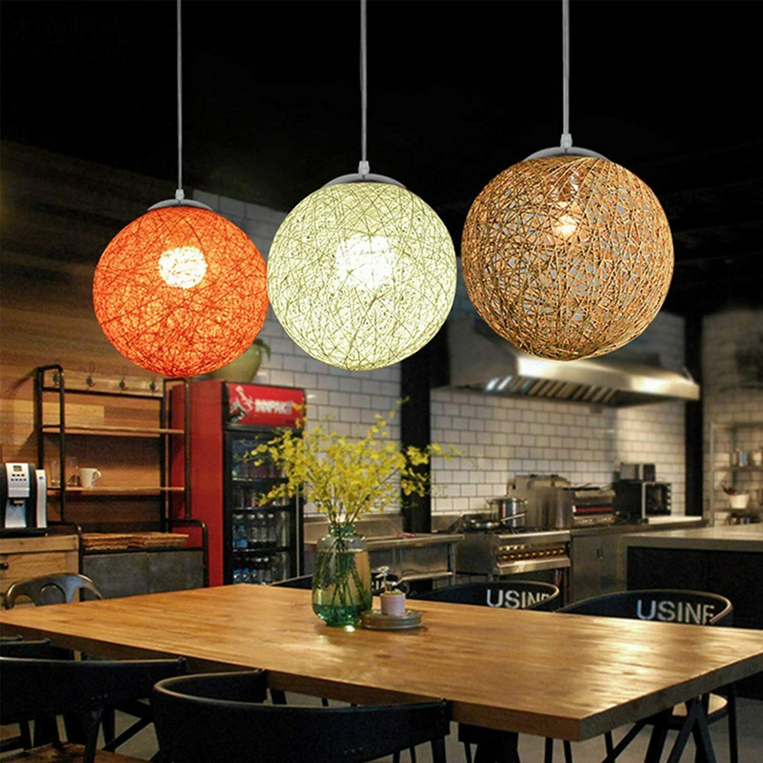 Modern Industrial Rattan Wicker Woven Ball Globe Pendant Light with two outlets, showcasing its stylish design and natural rattan texture.