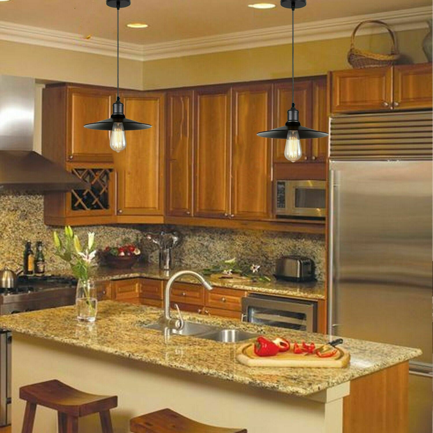 Modern pendant lighting fixture with a sleek black metal shade, ideal for kitchen and dining areas.