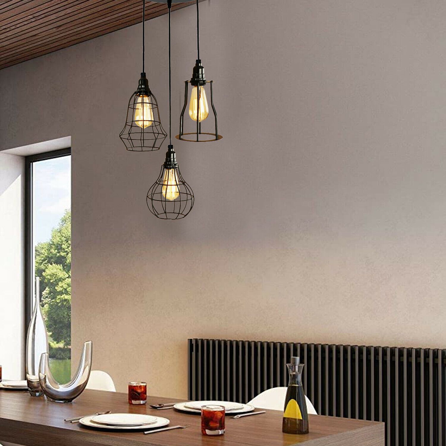 Modern Style 3 Point Pendant Set Ceiling Light Fixture with bulb guard cage in black, showcasing its elegant design and three light holders.