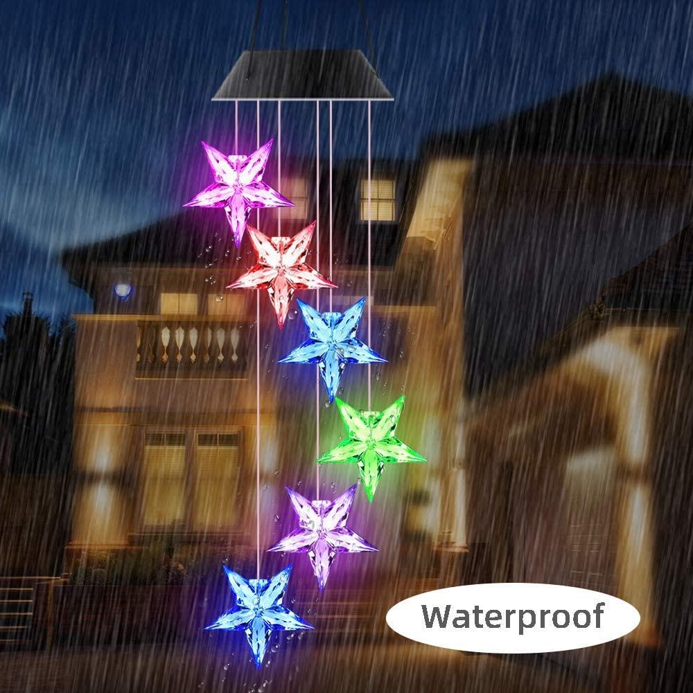 Colorful star-shaped lights in rain.