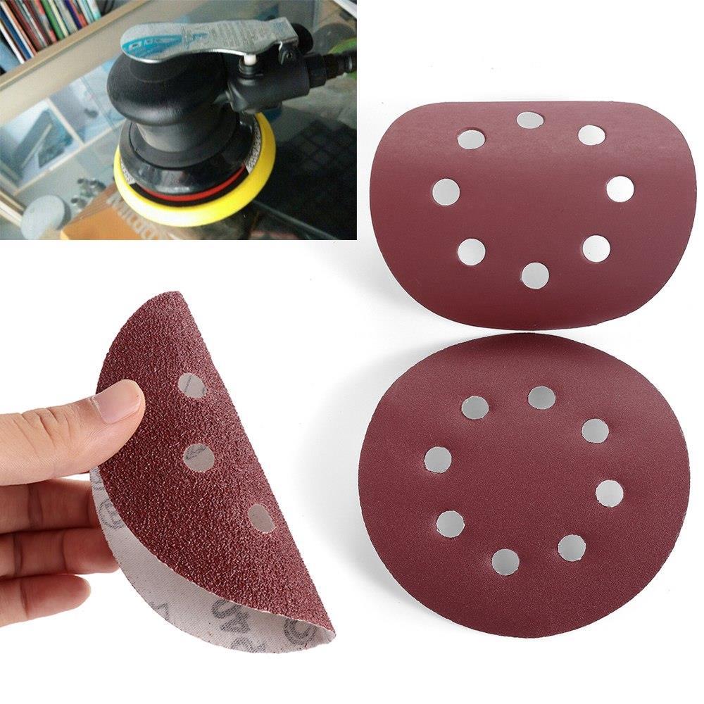 P-400 5 inch 8 Hole Sanding Discs made of aluminum oxide, ideal for sanding metal, wood, and jade, featuring a red color and 8 holes for dust extraction.