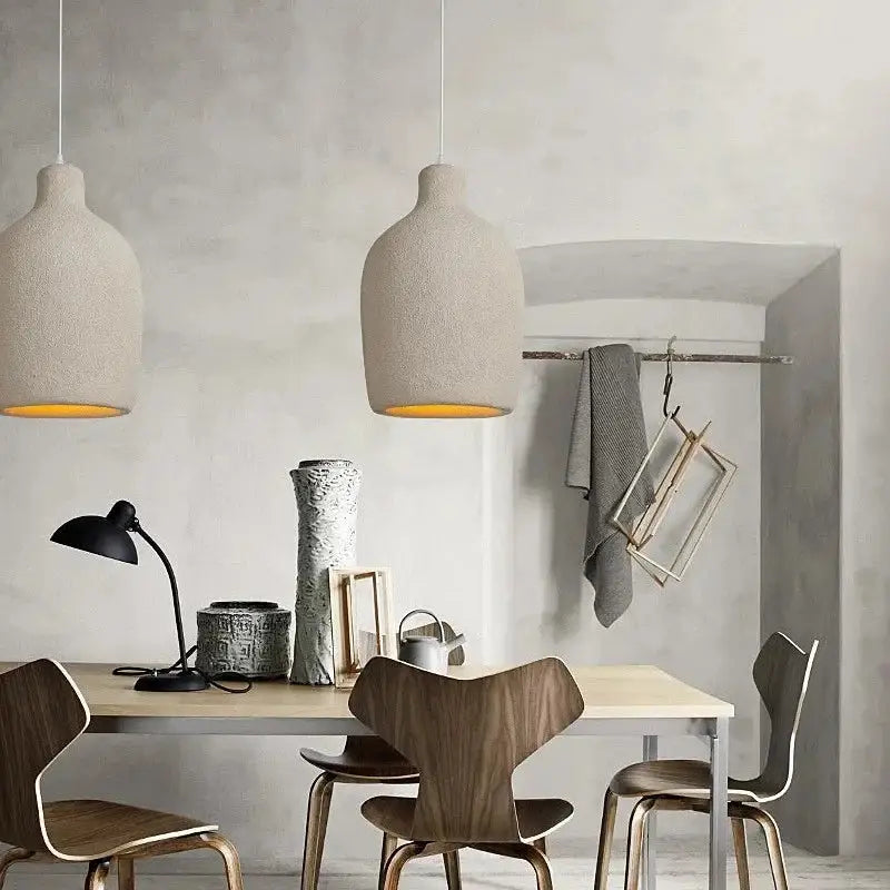 Rachu Pendant Light showcasing a matte finish lampshade with a luxurious gold interior, perfect for modern home decor.