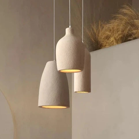 Rachu Pendant Light showcasing a matte finish lampshade with a luxurious gold interior, perfect for modern home decor.