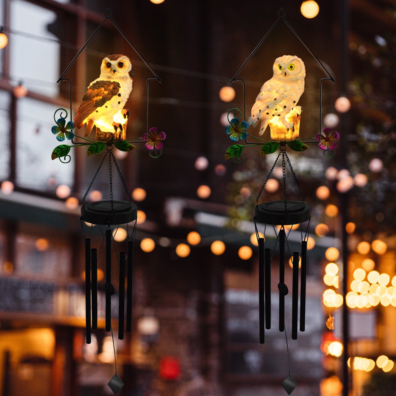 A beautifully crafted solar owl wind chime light featuring a lifelike owl sculpture atop metal chimes, glowing softly at night.