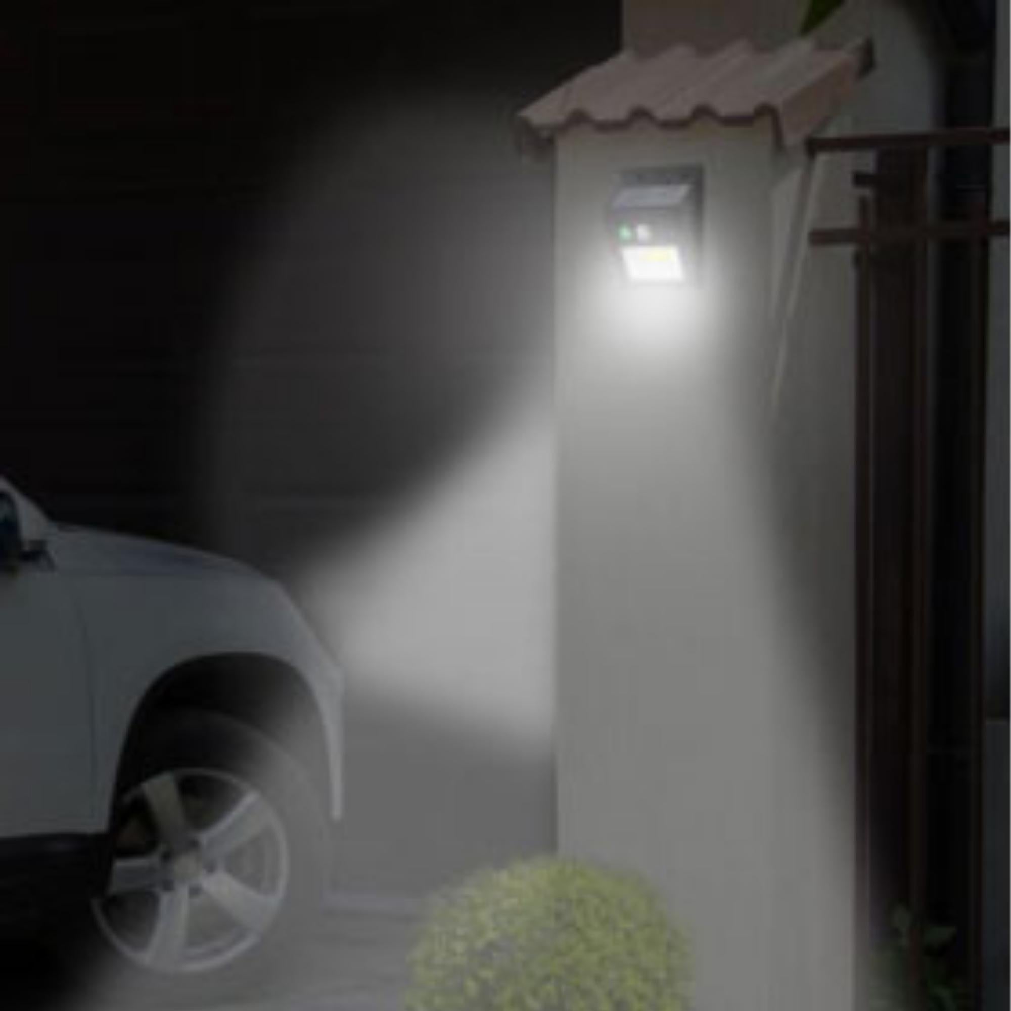 Super Bright Solar LED Motion Sensor Light with 500 lumens, showcasing its sleek design and features for outdoor use.