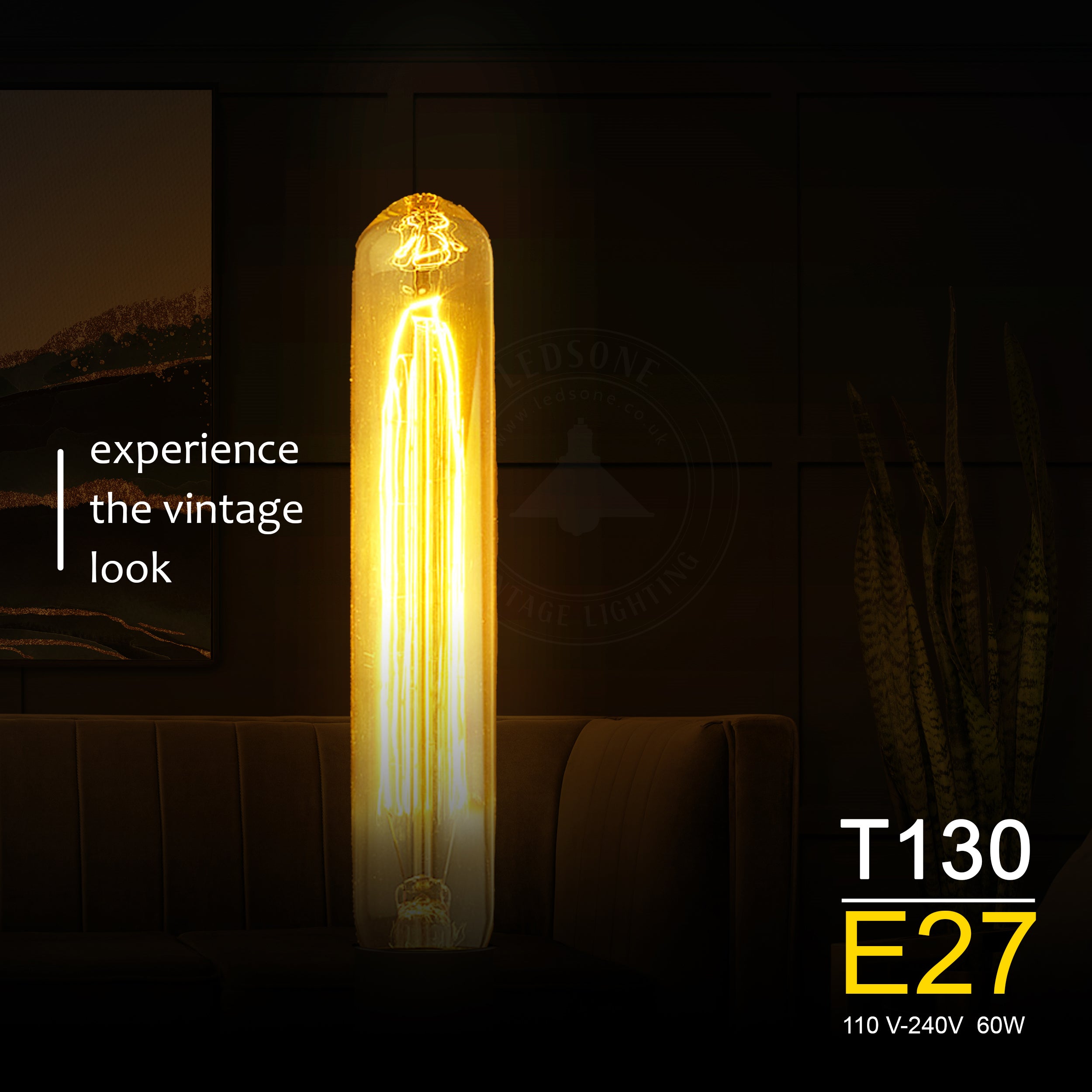 T130 60W E27 dimmable filament vintage light bulb with warm white glow, showcasing its elegant design and glass construction.