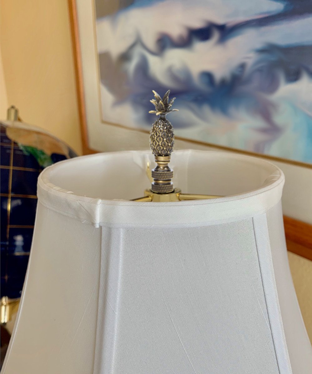 Tall Pineapple Lamp Finial in antique brass metal, featuring a pineapple shape and antiqued finish, perfect for enhancing lamps.