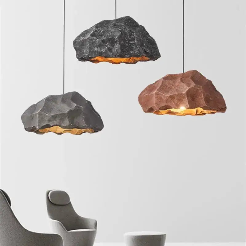 Tanmaya Light chandelier showcasing a handcrafted design in four color options: Black, Brown, White, and Grey, with LED bulbs for illumination.