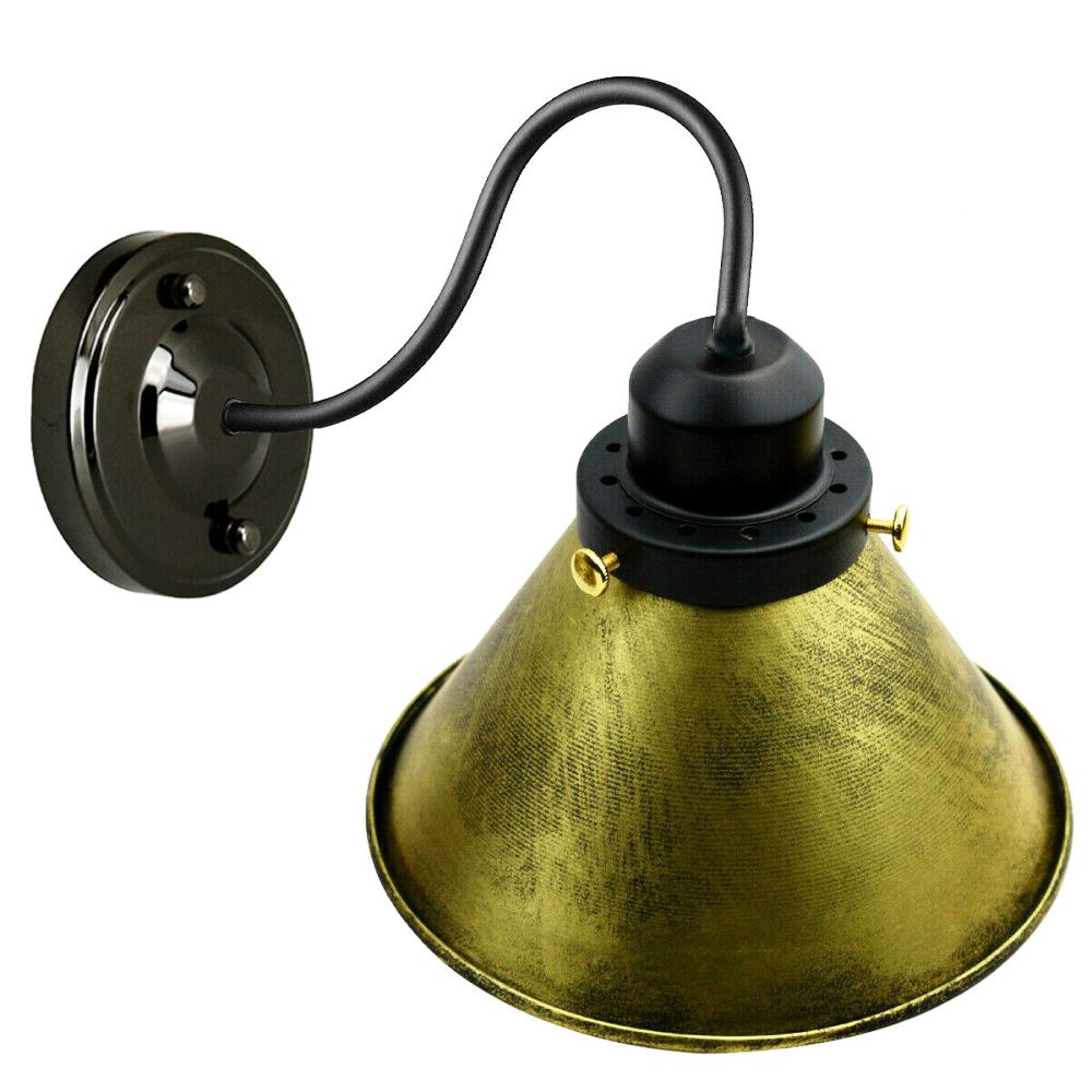 Vintage wall light shades featuring brushed brass finish and industrial design, perfect for loft-style interiors.