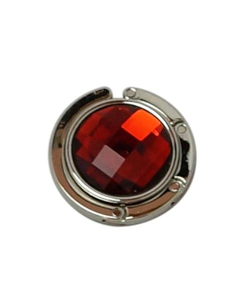 Silver circle with red gem